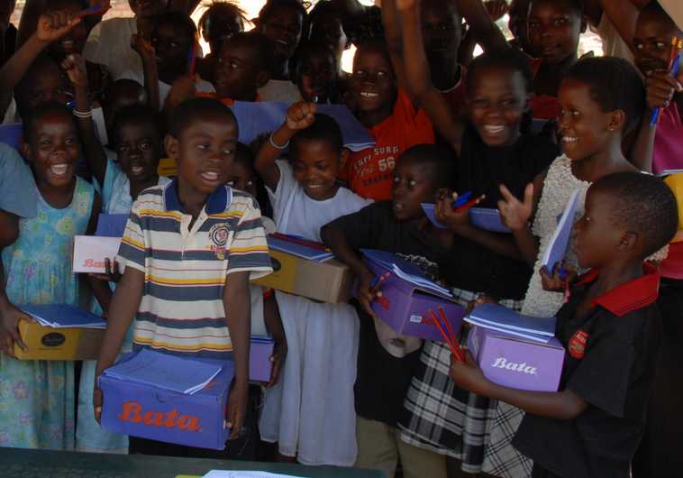 Nacwola kids getting thier first pair of shoes!